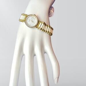 Vintage Xanadu Quartz Hong Kong Metal Wristwatch with Faux Diamond Surrounding